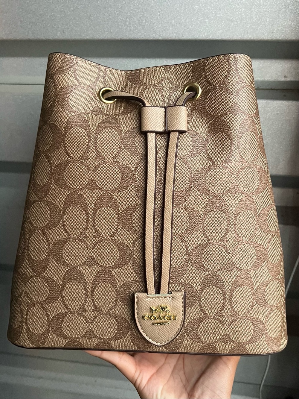 Coach Tan Signature Canvas Drawstring Bucket Bag